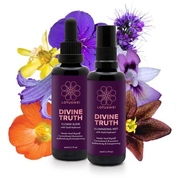 LotusWei Divine Truth flower essence and illuminating mist bottles displayed with vibrant flowers, representing emotional and energetic wellness products.